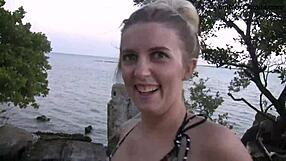 Blonde teen strips out of bikini for public beach flashing