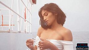 exotic playboy model undresses outdoors and on a boat