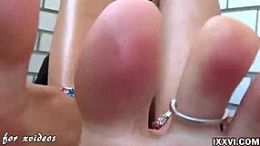 Watch how she works a big dildo with footjob and handjob.