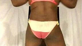 Watch this sexy shemale twerking her ass to the music.