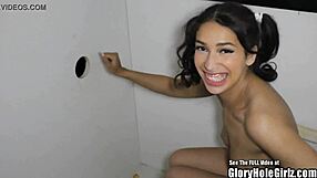 Pigtail beauty sucks cocks through gloryhole, swallowing eagerly