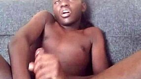 Hot gay black man enjoys fingering his ass and masturbating