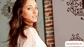 sexy babe strips down to lingerie, ripping clothes off her big tits