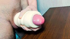 Solo beauty gets orgasm and moans while using sex toy with fake cum