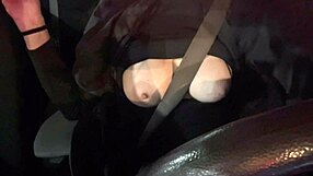 Artemisia Love flashes her big tits while driving