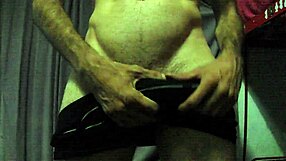 the mature man strokes his big cock and cums nicely