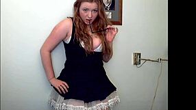 hey, wanna see this redheaded slut strip and tease with her ass?