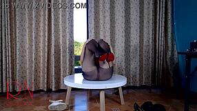 Curvy brunette maid strips in pantyhose at dorm table