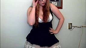 hey, wanna see this redheaded slut strip and tease with her ass?