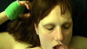 Milf receives second load of jizz on her face in detailed cumshot scene.
