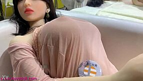 Wm sex doll tested for breast softness. Huge tits simulated for real fuck doll action.