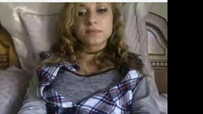 cute teen with perfect tits undressing and playing with toys in a casual setting