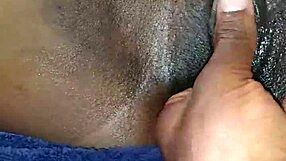 Black ebony beauty indulges in close-up solo play.