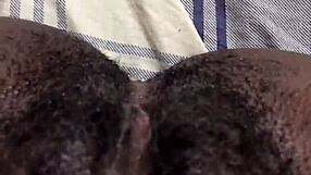 Homemade ebony babe teases her big wet pussy.