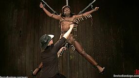 Device Bondage Features Blonde and Ebony in Rough Gagging Play