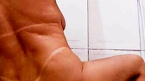 milf slut naked in bathroom inserting dildo in her pussy behind the scenes