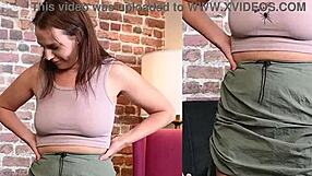 Alisha Adams models various outfits and tapes her boobs for us.