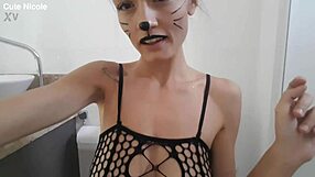 skinny cute girl with small tits gets body painted in bathroom fetish scene