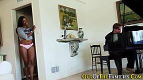 Ebony stepsis gives handjob to big cock, ending in mouth jizz.