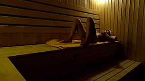 I caught this girl fingering herself in the sauna at night.