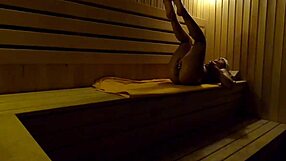 I caught this girl fingering herself in the sauna at night.