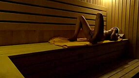 I caught this girl fingering herself in the sauna at night.