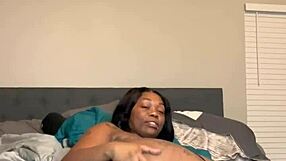 Petite black babe shakes her big wet ass