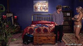 Watch this young guy roughly banging the tied busty milf.