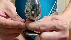 Asian babe with pierced nipples trained in swimsuit costume.