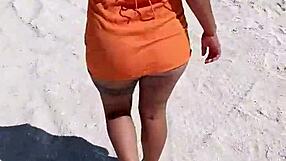 Mexican babe flaunts tits and ass on public beach! 😍🍑