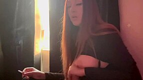 Artemisia Love uses dildo while smoking cigarette