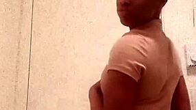 Hey, check out this ebony girl flashing her ass in the bathroom