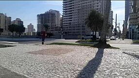 African Woman Poses At The Beach Lighthouse