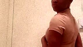 Hey, check out this ebony girl flashing her ass in the bathroom