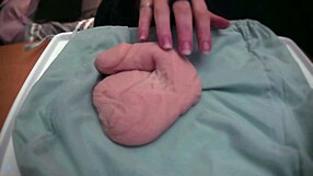 Amateur plays with a soft limp fake toy without audio