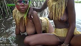 My two African Zulu wives bathing outdoors! Which big tits do you like better?