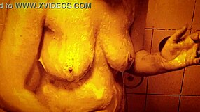 I enjoy a sexy slow motion shower with my ass and tits on display.