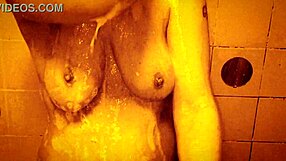 I enjoy a sexy slow motion shower with my ass and tits on display.