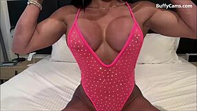 Exotic female bodybuilder shows off muscular flexes