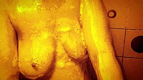 I enjoy a sexy slow motion shower with my ass and tits on display.