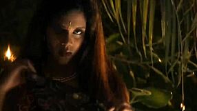 A sensual brunette Indian woman performs an erotic striptease while undressing sensually.