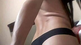 sexy and lovely crossdresser poses in lingerie showing off curves