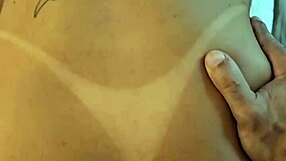 Kalena Mitrak rides dildo in bedroom while talking dirty about wanting double penetration. She squirts in orgasm as husband watches cuckold scene.