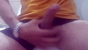 Watch This Punheteiro Explode With Cum In The Bathroom - Intense Handjob Action!