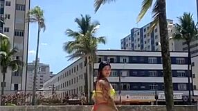 Wow, married babe draws eyes on the beach flashing in her tiny bikini!