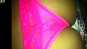 Hey, this Brazilian brunette housewife is playfully showing off her pink panties in a close-up tease.