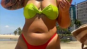 Wow, married babe draws eyes on the beach flashing in her tiny bikini!