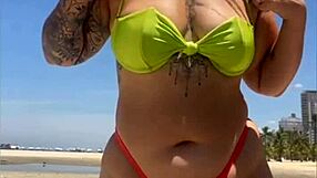 Wow, married babe draws eyes on the beach flashing in her tiny bikini!