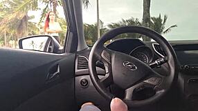 beautiful girl risks public masturbation on the beach sidewalk, touching herself in the car for an outdoor thrill.