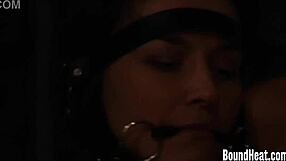 two hot lesbian slaves tied up together by dominant madame, contrasting submission with intense domination